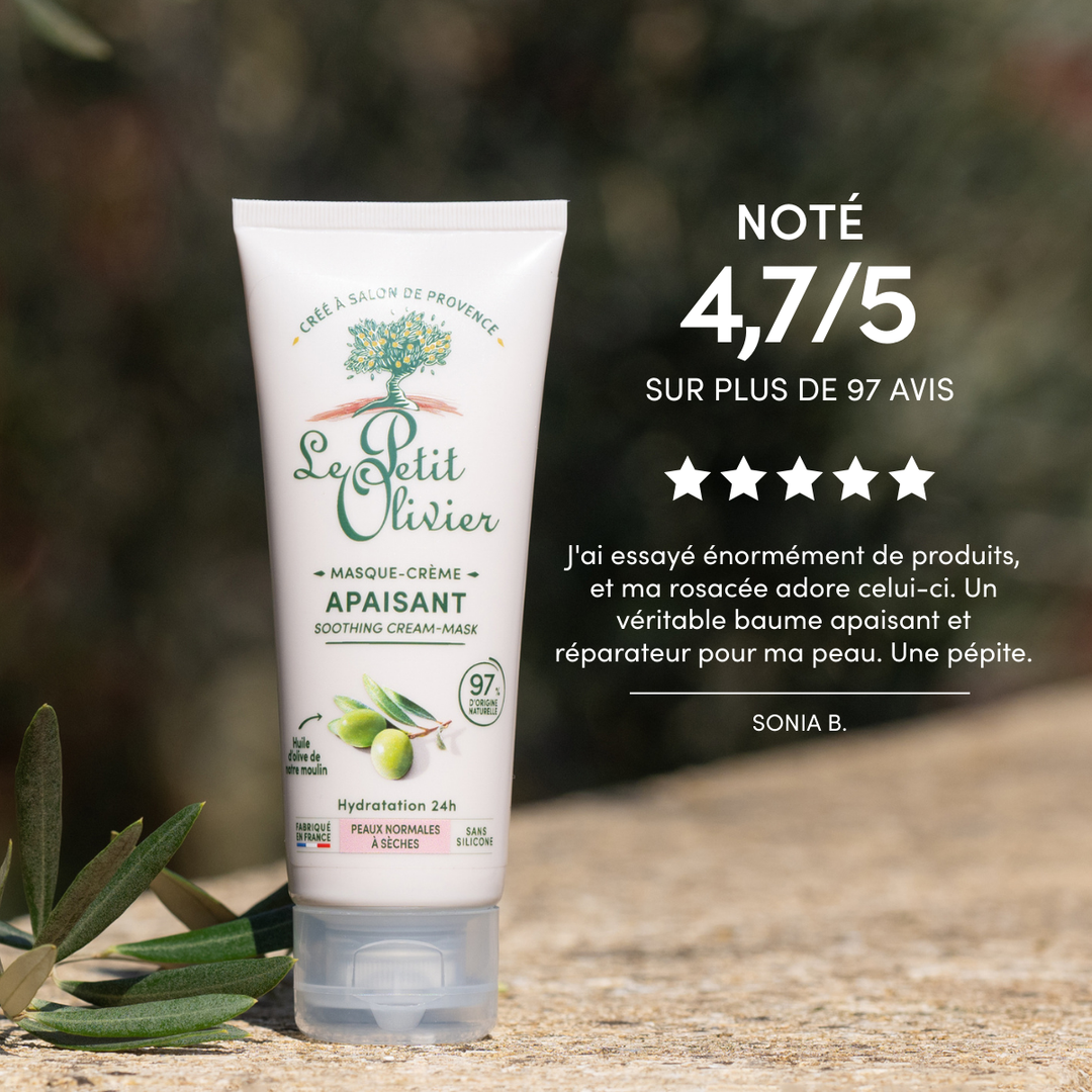 Un tube de « Le Petit Olivier Masque Visage Hydratant 24h » pour peaux sèches est présenté en extérieur, posé sur une surface rustique parsemée de feuilles. Une légende met en avant sa note de 4,7/5, attribuée sur la base de plus de 97 avis, et présente un témoignage positif d'un client.