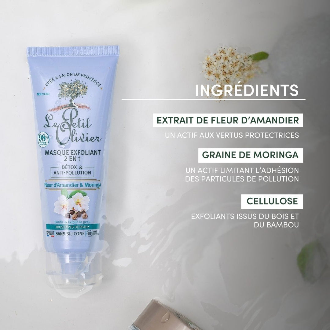 Un tube de « Le Petit Olivier Masque Exfoliant 2 en 1 Détox & Anti-Pollution » est présenté aux côtés de ses ingrédients clés — extrait de fleur d’amandier, graines de moringa et cellulose —, rehaussés de notes florales, pour une peau éclatante.