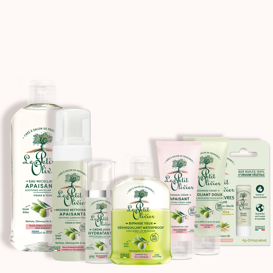 Le Petit Olivier « Rituel Soin Visage Complet Douceur » est un coffret de soins destiné aux peaux normales à sèches, comprenant une eau micellaire, une mousse nettoyante à l'olive, une crème hydratante, des baumes pour les mains et les lèvres, un démaquillant pour les yeux et un gommage doux.