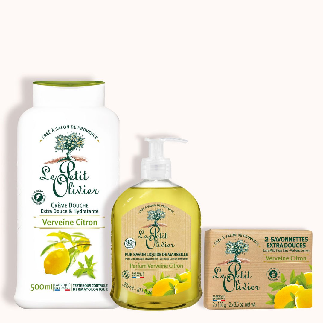 The Trio Vivifiant - Douche & Savon - Parfum Verveine-Citron includes a 500ml shower cream, a liquid soap pump, and two Savon de Marseille bars. All are made in France with lemon imagery and green accents.