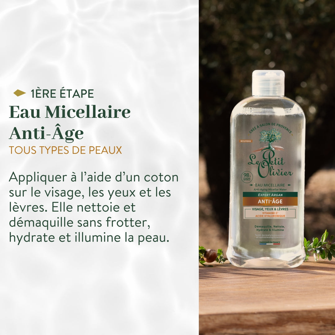 Un flacon de « Rituel Soin Visage Express Anti-Âge » de Le Petit Olivier repose à l'extérieur, posé sur du bois. La notice en français recommande d'utiliser ce soin visage anti-âge à l'aide d'un coton pour nettoyer, démaquiller, hydrater et illuminer la peau — idéal avant l'application d'un sérum ou d'une crème.
