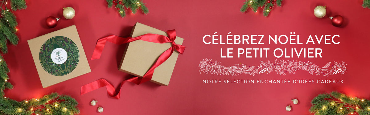 Des coffrets cadeaux ornés de rubans rouges sur un fond rouge festif, entourés de branches de sapin et de décorations dorées et rouges. Le texte en français indique : « Célébrez Noël avec Le Petit Olivier » et « Notre sélection enchantée d’idées cadeaux ».